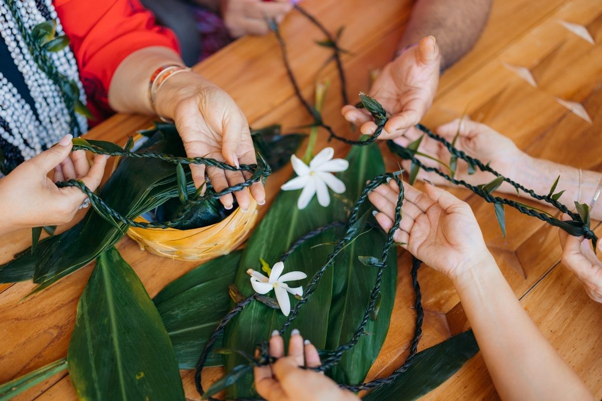 Someone making a bracelet