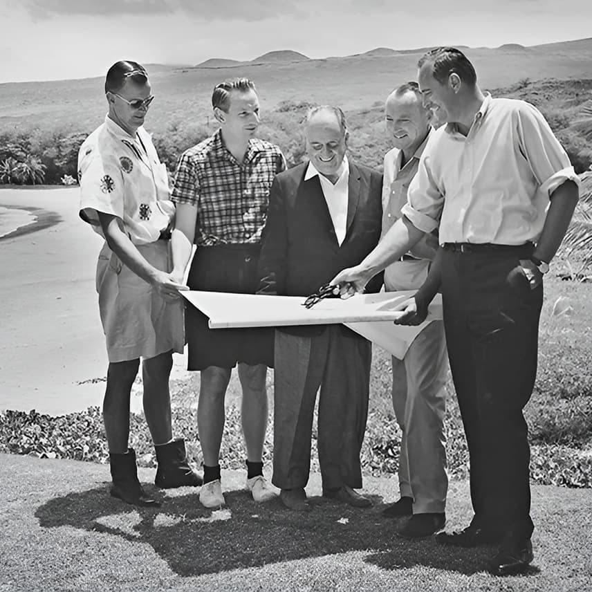 A group of developers reviewing plans