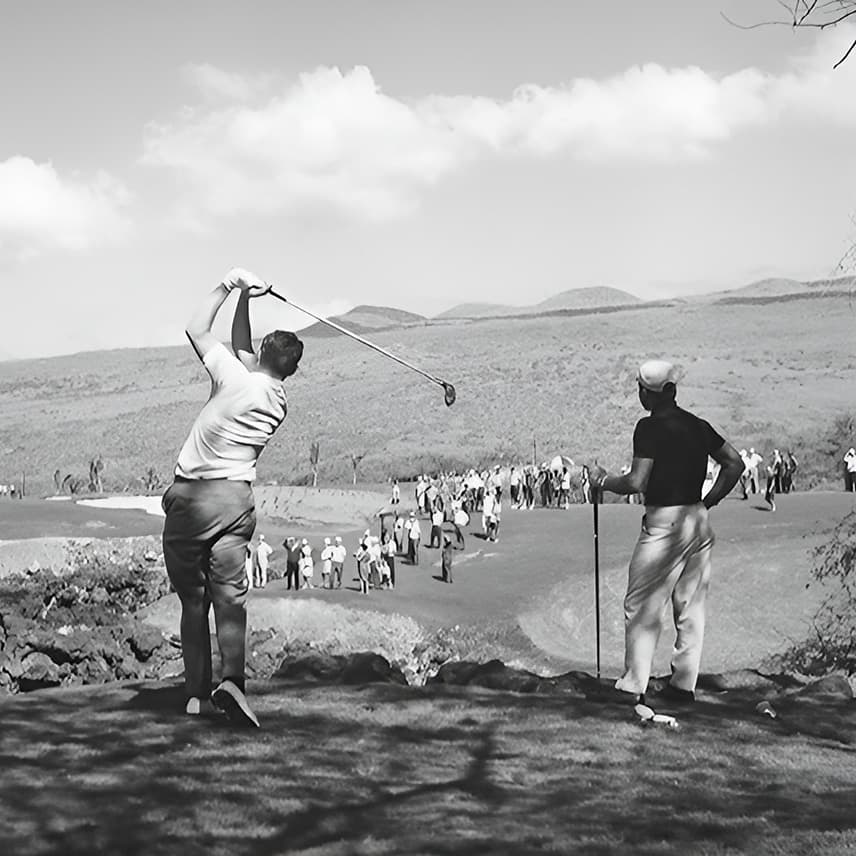 A golfer takes a swing