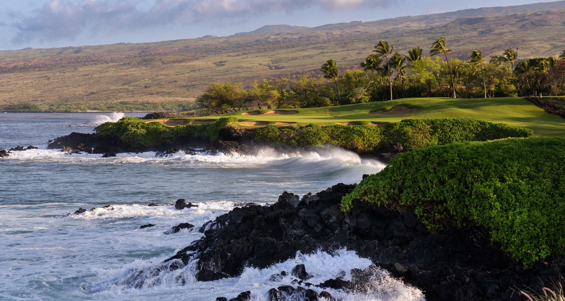 Golf course fairway along the rocky shoreline